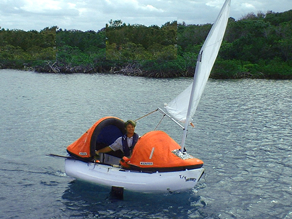 dinghy and sailboat